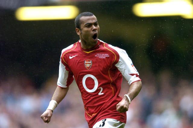 Ashley Cole celebrates scoring for Arsenal