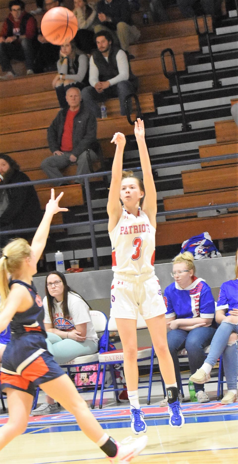 Senior guard Kyndall Drake drills a three against North Putnam. Drake finished with 11 points in the game.