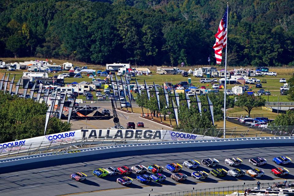 Ross Chastain (1) leads the field during the 2022 NASCAR Cup Series playoff race at Talladega Superspeedway.