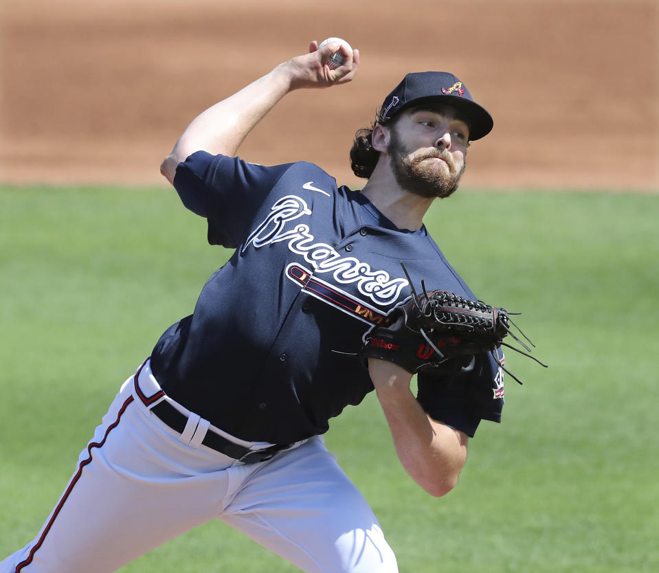 Atlanta Braves starting pitcher Ian Anderson delivers against the Minnesota Twins during the first inning of a spring training baseball game at CoolToday Park, Tuesday, March 2, 2021, in North Port, Fla. (Curtis Compton/Atlanta Journal-Constitution via AP)