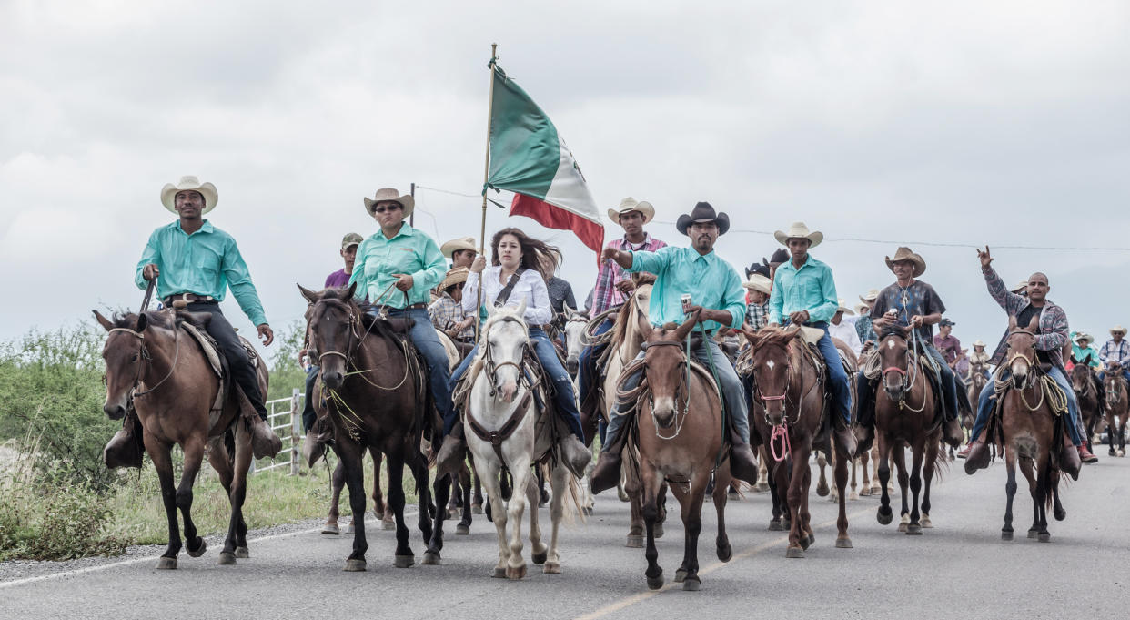 Image:  A cabalgada, Spanish for cavalcade, during the Dia de los Negros or Juneteenth celebration in the village of Nacimiento de los Negros, Mexico, in 2015. (Dzilam Mendez)