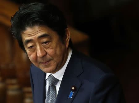 Japan's Prime Minister Shinzo Abe speaks during an ordinary session of parliament in Tokyo January 27, 2015. REUTERS/Yuya Shino