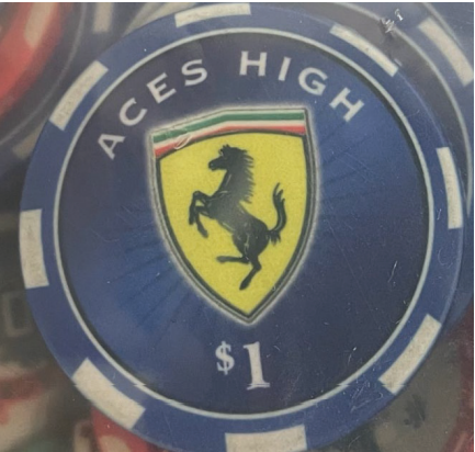 This evidence photo shows a Ferrari-themed poker chip recovered from an illegal gambling operation on Blossom Road.