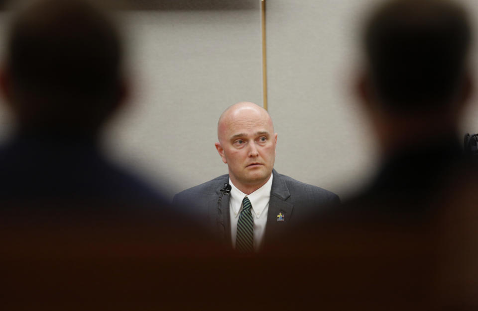 Fired Balch Springs police officer Roy Oliver, who is charged with the murder of 15-year-old Jordan Edwards, testifies with defense attorney Jim Lane during the sixth day of his trial at the Frank Crowley Courts Building in Dallas on Thursday, Aug. 23, 2018. (Rose Baca/The Dallas Morning News via AP, Pool)