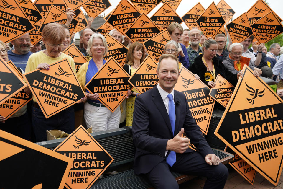 Newly-elected Liberal Democrat lawmaker for Tiverton and Honiton Richard Foord celebrates in Crediton, England, Friday June 24, 2022. British Prime Minister Boris Johnson suffered a double blow as voters rejected his Conservative Party in two special elections dominated by questions about his leadership and ethics. The centrist Liberal Democrats overturned a big Conservative majority to win the rural south west England seat of Tiverton and Honiton, while the main opposition Labour Party reclaimed Wakefield in northern England from Johnson's Tories. (Andrew Matthews/PA via AP)