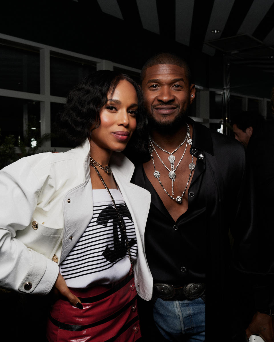 Kerry Washington and Usher, both wearing Chanel, catch up during the Chanel and Charles Finch 15th annual pre-Oscars dinner at the Beverly Hills Hotel's Polo Lounge on March 9, 2024.