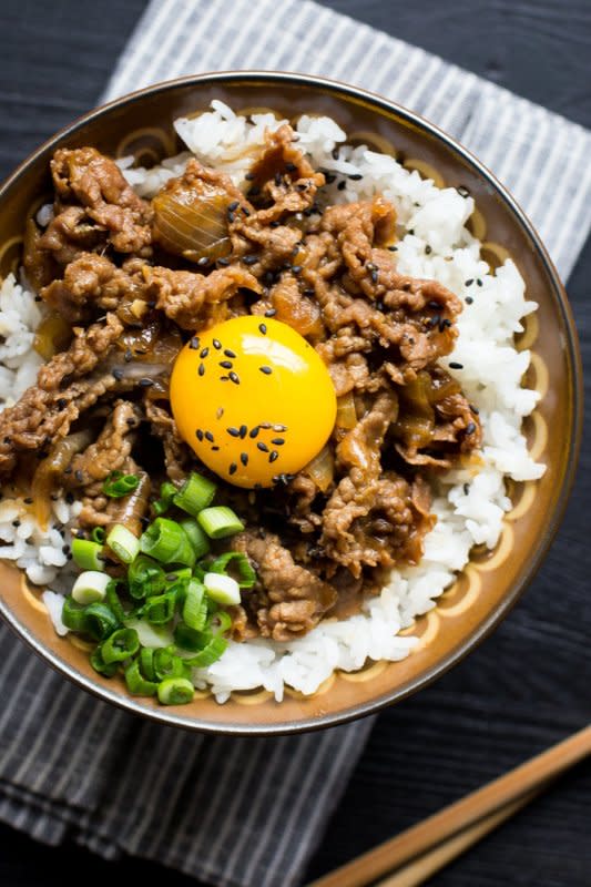 <p>The Domestic Man</p><p>Deliciously fragrant and tasty, this Japanese beef and rice bowl makes the perfect meal.</p><p><strong>Get the recipe: <a href="https://thedomesticman.com/2016/09/13/gyudon/" rel="nofollow noopener" target="_blank" data-ylk="slk:Japanese Beef and Rice Bowl (Gyudon);elm:context_link;itc:0;sec:content-canvas" class="link ">Japanese Beef and Rice Bowl (Gyudon)</a></strong></p><p><strong>Related: <a href="https://parade.com/848946/felicialim/12-easy-chicken-casseroles-to-feed-a-crowd/" rel="nofollow noopener" target="_blank" data-ylk="slk:12 Easy chicken Casseroles to Feed a Crowd;elm:context_link;itc:0;sec:content-canvas" class="link ">12 Easy chicken Casseroles to Feed a Crowd</a></strong></p>