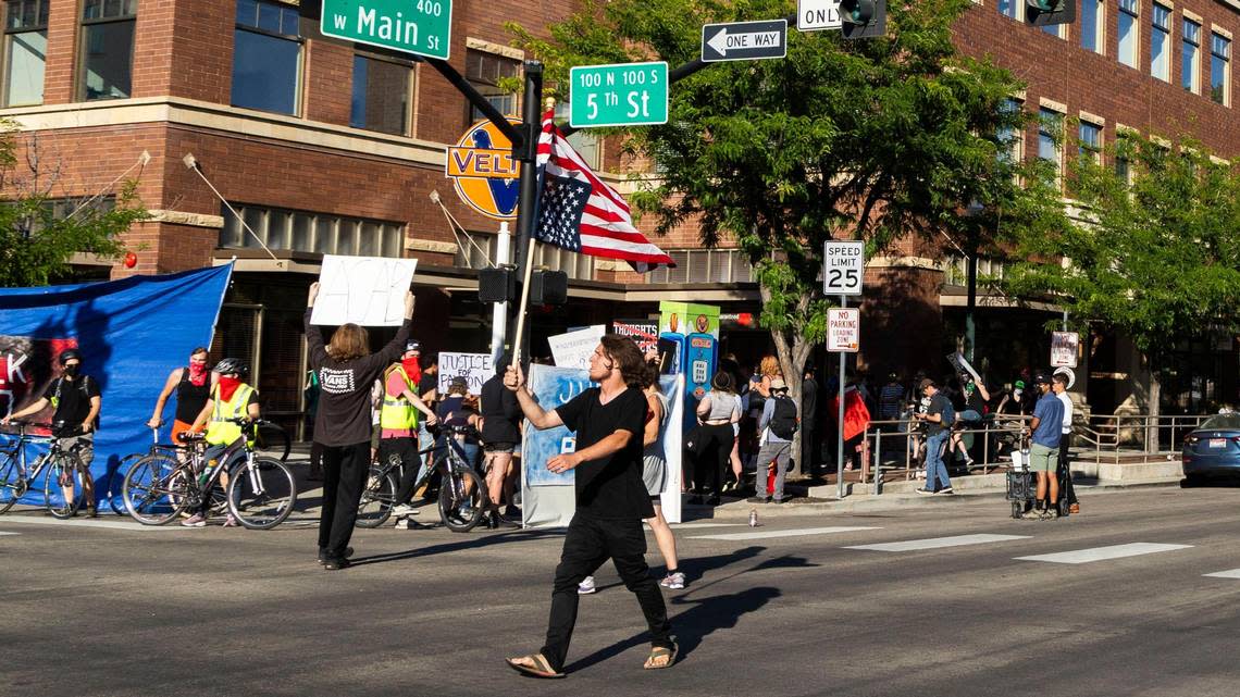 A crowd marches from Boise City Hall to the corner of 5th and Main streets in downtown Boise to protest the fatal shooting of 22-year-old Payton Wasson, of Nampa. Boise has yet to release the body-camera footage.