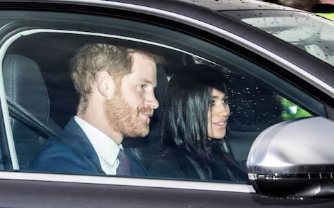 Harry and Megan arriving at the Buckingham Palace Christmas Lunch Party. - Credit:  Jeff Gilbert