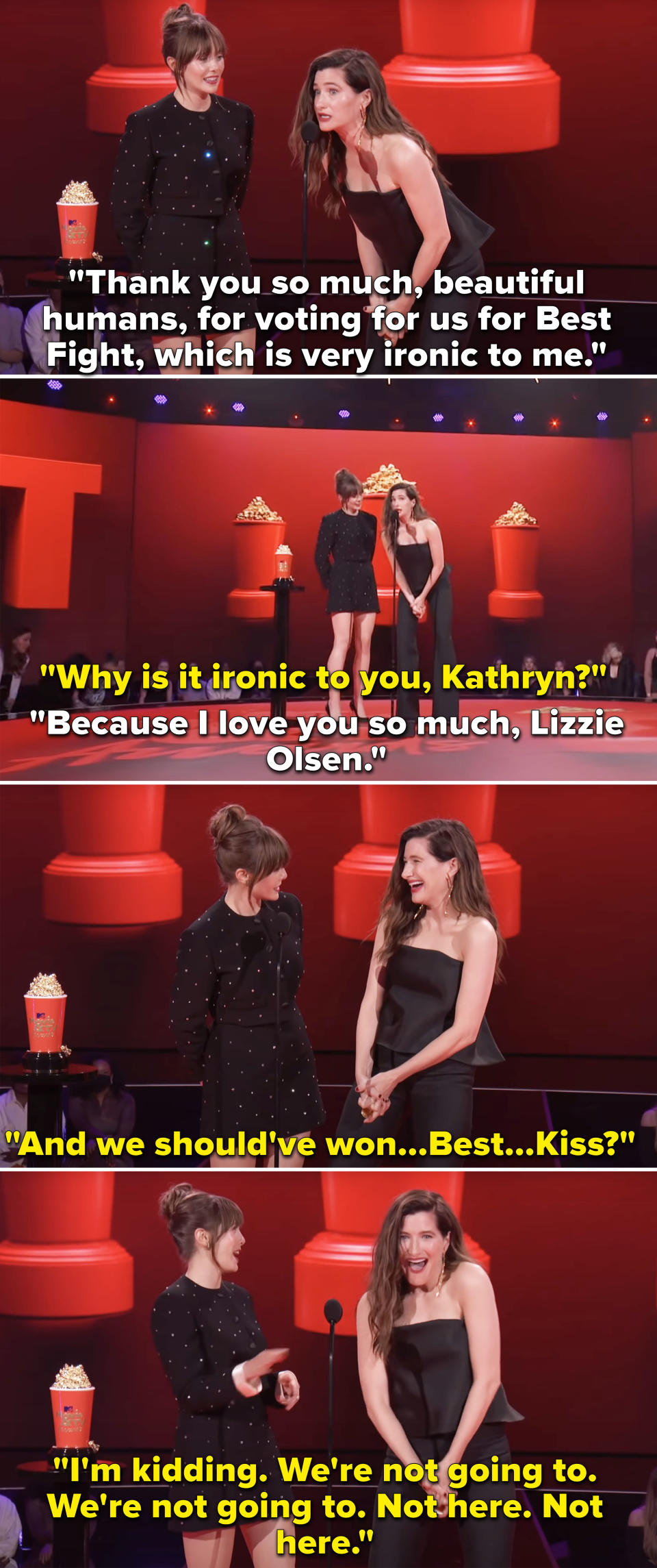 Elizabeth Olsen and Kathryn Hawn accepting an award for Best Fight, but saying, "And we should've won...Best...Kiss?"