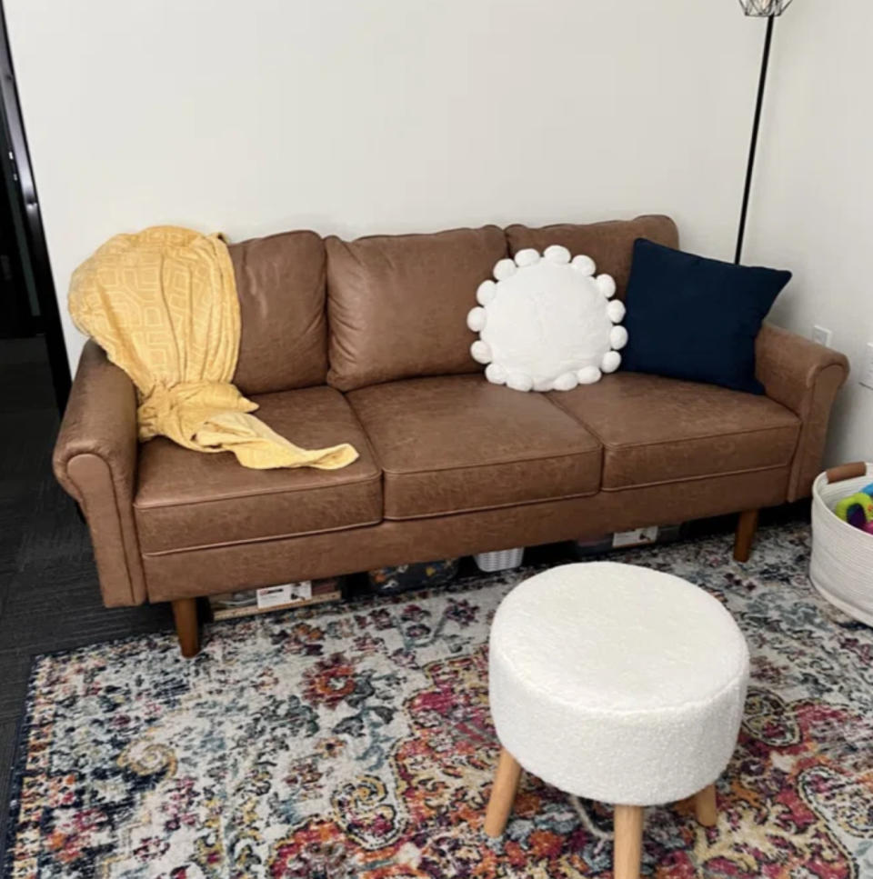 A reviewer's vegan leather sofa