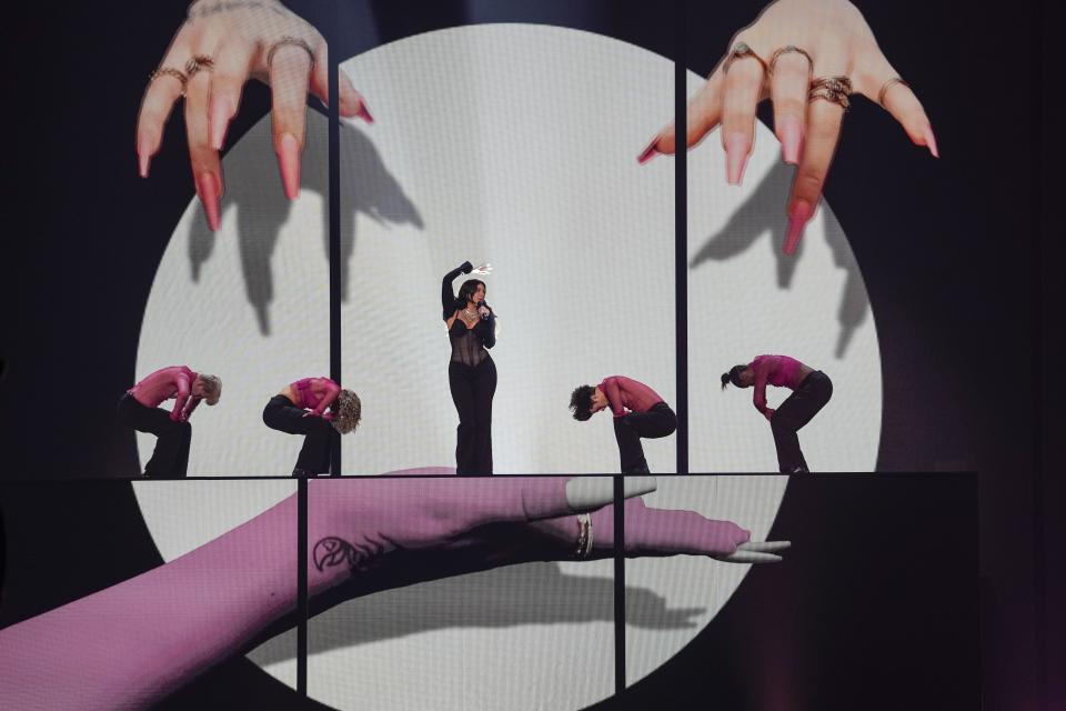 Mae Muller of the United Kingdom performs during dress rehearsals for the Grand final at the Eurovision Song Contest in Liverpool, England, Friday, May 12, 2023. (AP Photo/Martin Meissner)