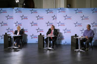 Gubernatorial candidates, from left, Democratic Gov. Janet Mills, Republican Paul LePage, and independent Sam Hunkler participate in a debate, Tuesday, Oct. 4, 2022, at the Franco Center in Lewiston, Maine. (AP Photo/Robert F. Bukaty)