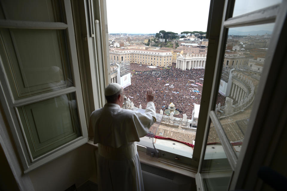 In this photo provided by the Vatican paper L'Osservatore Romano, Pope Francis delivers his Angelus prayer from the window of his studio overlooking St. Peter's Square, at the Vatican, Sunday, March 17, 2013. Breaking with tradition, Pope Francis delivered off-the-cuff remarks about God's power to forgive instead of reading from a written speech for the first Sunday window appearance of his papacy. He also spoke only in Italian, beginning with "buon giorno" (Good day) and ending with "buon pranzo" (Have a good lunch), instead of greeting the faithful in several languages as his last few predecessors had done. (AP Photo/L'Osservatore Romano)