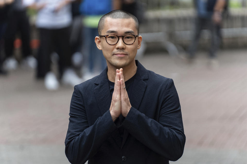 Michael Pang, a former pro-democracy district councilor, arrives at the West Kowloon Magistrates' Courts in Hong Kong, Thursday, May 30, 2024, ahead of verdicts in national security case. (AP Photo/Chan Long Hei)