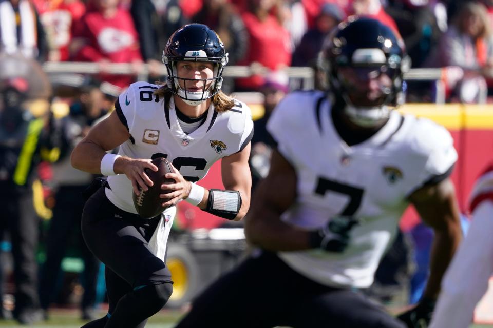 Jaguars quarterback Trevor Lawrence looks for an open reciever while Zay Jones (7) runs a route during the Jags game against Kansas City on Nov. 13.