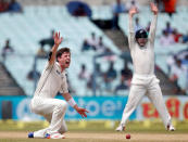 Cricket - India v New Zealand - Second Test cricket match - Eden Gardens, Kolkata, India - 02/10/2016. New Zealands' Matt Henry successfully appeals for the wicket of India's Cheteshwar Pujara. REUTERS/Rupak De Chowdhuri