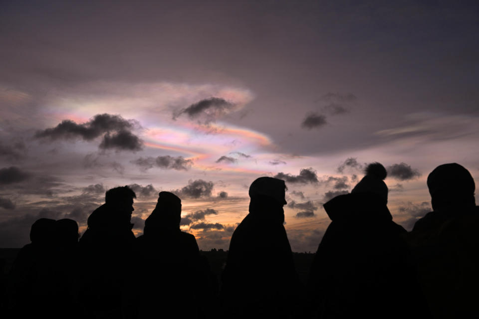 The sun rises with a rainbow effect during the winter solstice at Newgrange, a 5,200-year-old passage tomb, on Dec. 21, 2023 in Newgrange, Ireland.  / Credit: Charles McQuillan / Getty Images