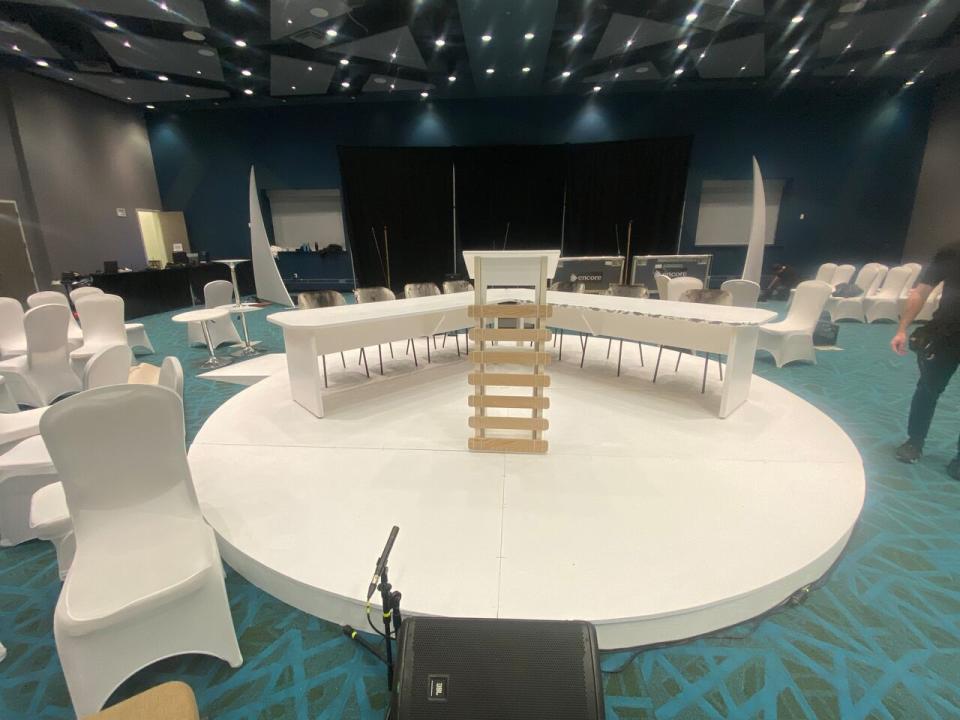 The table, podium and circular stage designed by Sylvia Cloutier and built by Samuel Kuluguqtuq for Nunavut's devolution ceremony. 