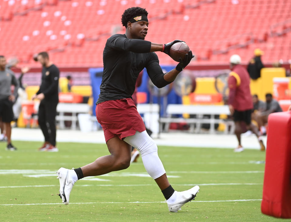 LANDOVER, MD - SEPTEMBER 25: Washington Commanders running back Brian Robinson Jr. on the field before the game at FedEx Field on September 25, 2022. Robinson is still recovering from gunshot wounds to his leg. (Photo by Katherine Frey/The Washington Post via Getty Images)