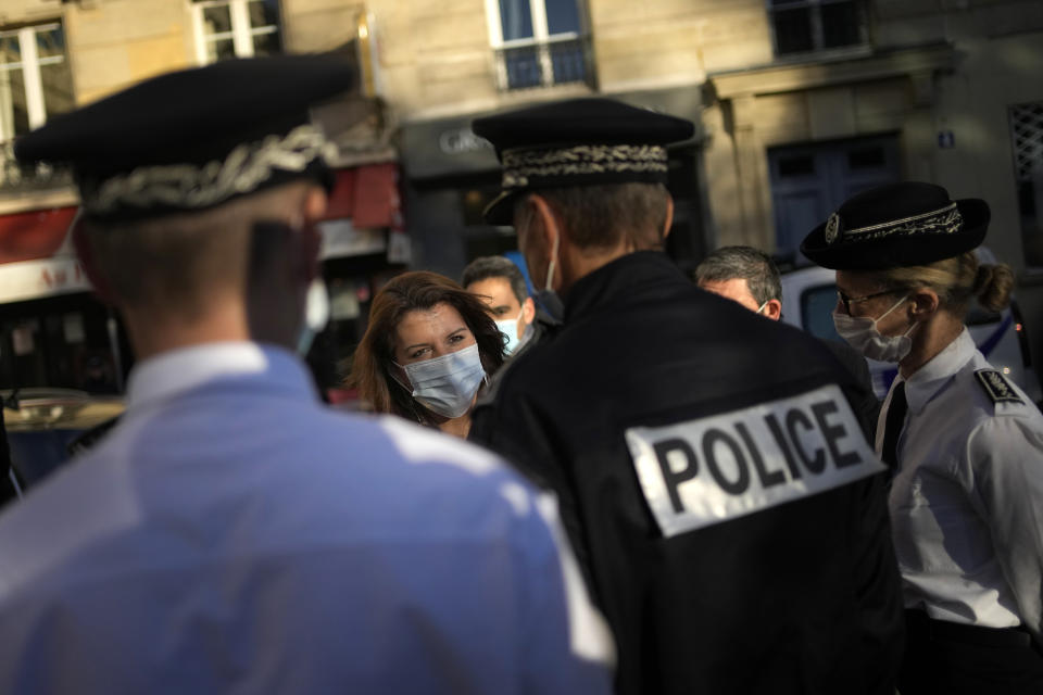 France's Junior Minister for citizenship Marlene Schiappa arrives to visit a police station in Paris, Tuesday, Nov. 23, 2021. French Junior Interior Minister Marlene Schiappa said France must further help women victims of violence to report abuses to the police, including via a new process to file a complaint at a friend’s home or in a place where they feel safe. (AP Photo/Christophe Ena)