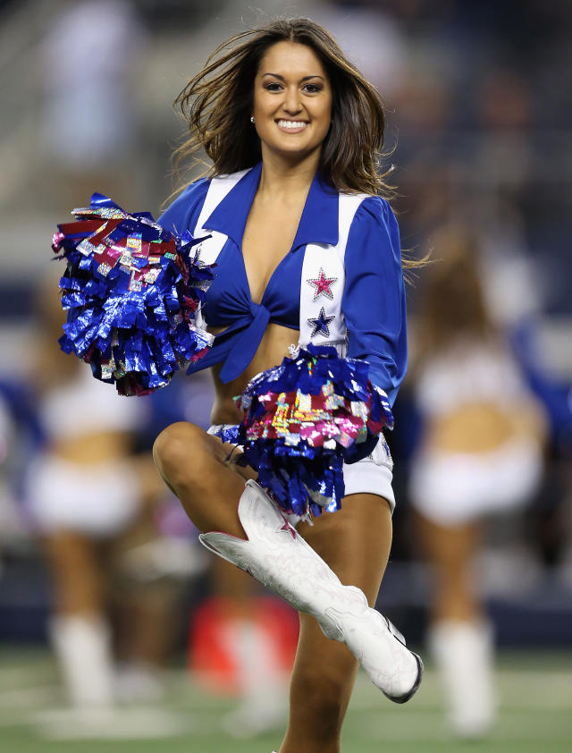 The Dallas Cowboys Cheerleaders perform during the game between the News  Photo - Getty Images