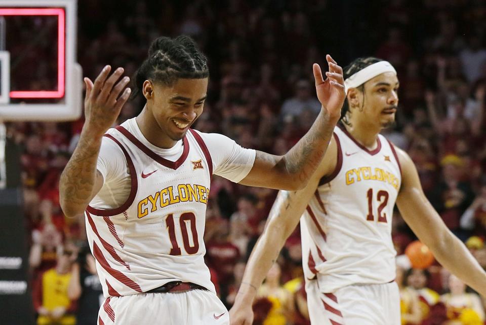 Iowa State Cyclones guard Keshon Gilbert (10) and forward Robert Jones (12) celebrate after winning 68-63 over BYU in the Senior Day Big-12 conference showdown of an NCAA college basketball at Hilton Coliseum on Wednesday, March 6, 2024, in Ames, Iowa.