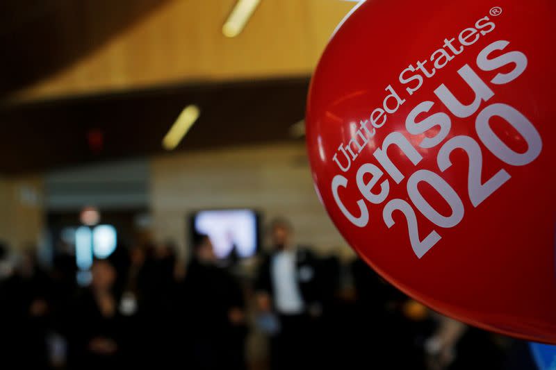 FILE PHOTO: Balloons decorate an event for community activists and local government leaders to mark the one-year-out launch of the 2020 Census efforts in Boston