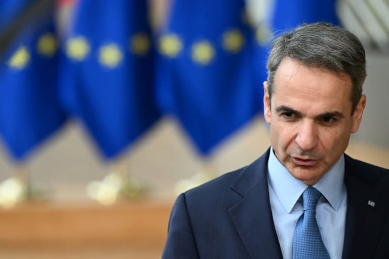 Le Premier ministre grec Kyriakos Mitsotakis s'adresse à la presse avant un sommet du Conseil européen à Bruxelles, le 21 mars 2024 (JOHN THYS)