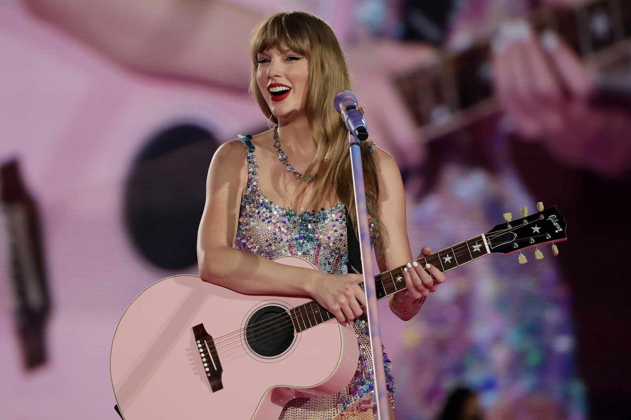 <p>Ashok Kumar/TAS24/Getty</p> Taylor Swift performs in Singapore in March 2024