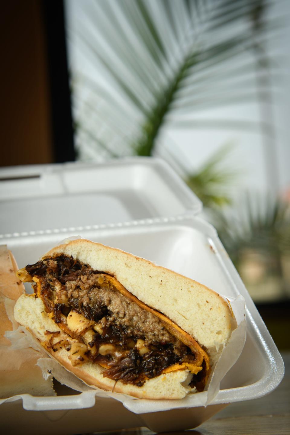 Mac Patty Oxtail sandwich from SimLo's Island Cafe at 3057 Boone Trail Ext.