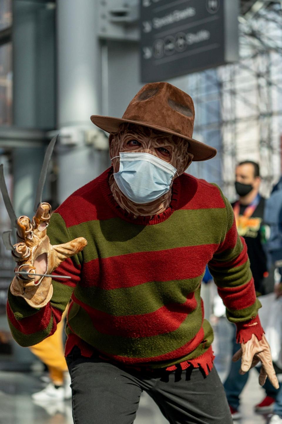 A cosplayer dressed as Freddy Krueger at New York Comic Con 2021.