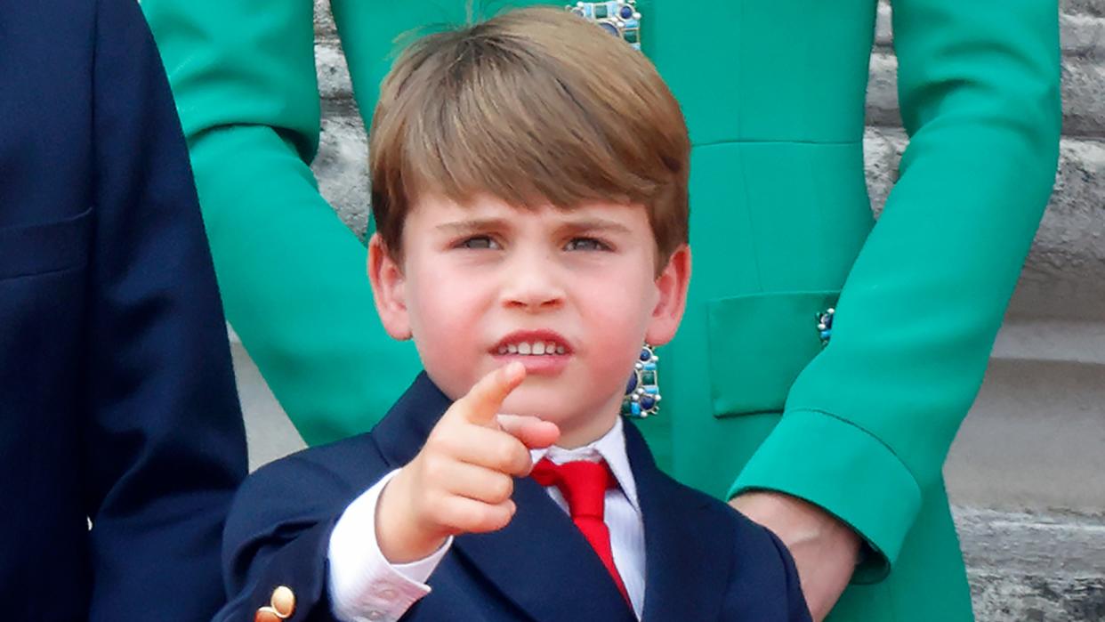   Prince Louis of Wales is pictured pointing while he watches an RAF flypast from the balcony of Buckingham Palace during Trooping the Colour on June 17, 2023 in London, England. . 