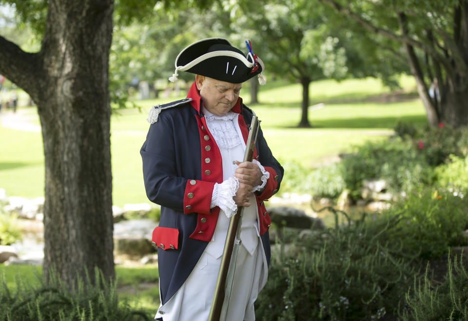 <p>Wayne Correges, of the Sons of the American Revolution, listens to “Taps” at the Texas State Cemetery Memorial Day Service in Austin, Texas, on Monday May 30, 2016. (Photo: Jay Janner/Austin American-Statesman via AP) </p>