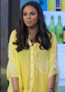 Celebrities in neon fashion: Rochelle Humes teamed her neon yellow team with aztec-style jewellery.<br><br>[Rex]