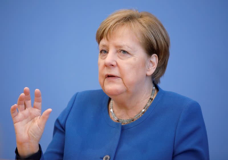 German Chancellor Merkel addresses a news conference on coronavirus in Berlin