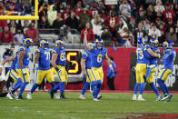 Los Angeles Rams holder Johnny Hekker (6) celebrates with teammates after kicker Matt Gay kicked the game-winning field goal against the Tampa Bay Buccaneers during the final seconds of an NFL divisional round playoff football game, Sunday, Jan. 23, 2022, in Tampa, Fla. (AP Photo/John Raoux)