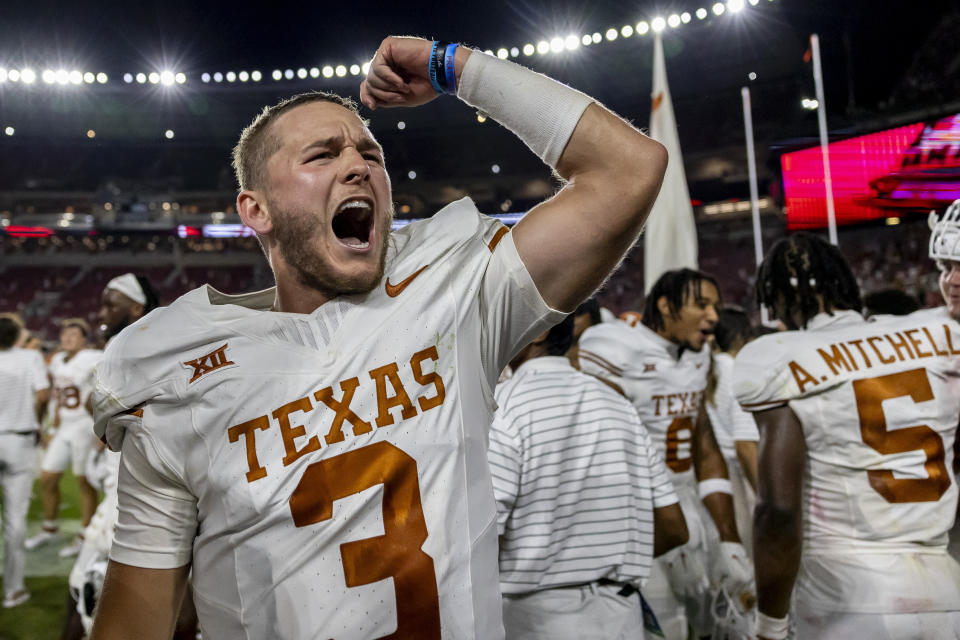 Texas quarterback Quinn Ewers (3) celebrates the team's win over Alabama on Saturday, Sept. 9, 2023, in Tuscaloosa, Ala. (AP Photo/Vasha Hunt)