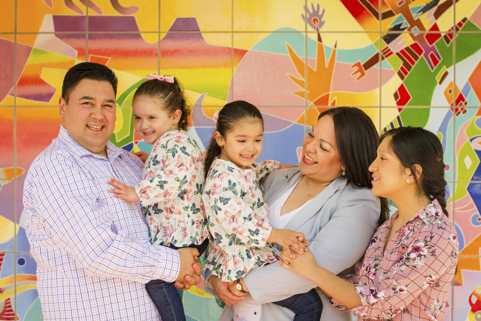 This undated photo provided by the Luz Escamilla Campaign shows Utah lawmaker and Salt Lake City former mayoral candidate Luz Escamilla with her husband Juan Carlos and three of her children, Aileen, Sol and Cielo, in Salt Lake City. She was among the first candidates to use a new Utah law that allows campaign money to be used for childcare. A small but growing number of states are passing similar measures, something that advocates say will allow more women to run for office amid a historic rise in the number of female candidates around the country. (Brandon Cruz/Luz Escamilla Campaign via AP)