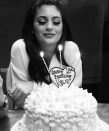 For her 18th birthday, Jenner celebrated with family and friends for an entire weekend. While making a wish, Jenner looks picture perfect with her sculpted eyebrows and major lips.