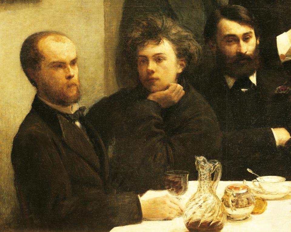 Verlaine, left, with Rimbaud and Léon Valade in a detail from By the Table, 1872, by Henri Fantin-Latour