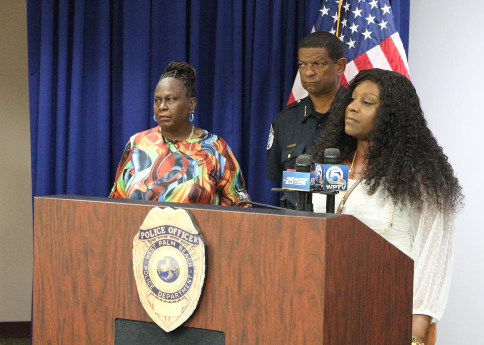 Sadarrin Rowe (right) speaks about her mother at a West Palm Beach Police Department press conference. Rowe's mother Kawana Holmes has been missing since around 1997.