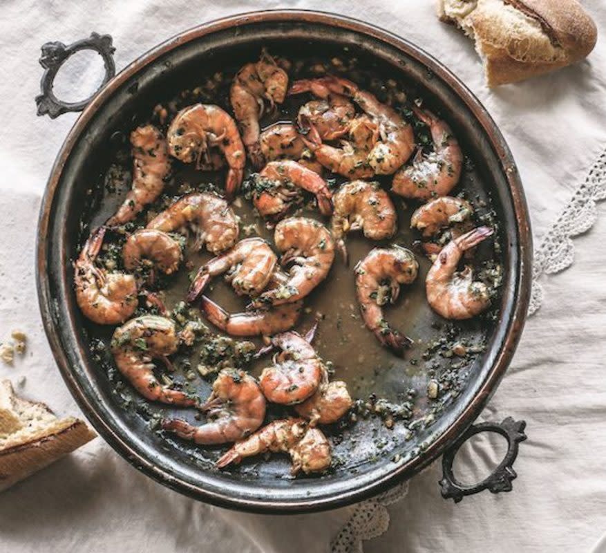 <p>Jerrelle Guy</p><p>This succulent Louisiana Barbecued Shrimp has zero bbq sauce and is instead braised in a white wine and garlic-butter sauce.</p><p><strong>Get the recipe: <a href="https://parade.com/921855/parade/toni-tipton-martin-louisiana-barbecued-shrimp/" rel="nofollow noopener" target="_blank" data-ylk="slk:Louisiana Barbecued Shrimp;elm:context_link;itc:0;sec:content-canvas" class="link rapid-noclick-resp">Louisiana Barbecued Shrimp</a></strong></p><p><strong>Related: <a href="https://parade.com/1379060/kristamarshall/grilled-shrimp-recipes/" rel="nofollow noopener" target="_blank" data-ylk="slk:50 Best Grilled Shrimp Recipes;elm:context_link;itc:0;sec:content-canvas" class="link rapid-noclick-resp">50 Best Grilled Shrimp Recipes</a></strong></p>