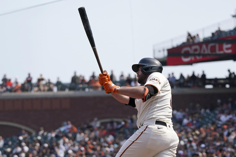 San Francisco Giants' Darin Ruf hits an RBI-double against the Milwaukee Brewers during the eighth inning of a baseball game in San Francisco, Thursday, Sept. 2, 2021. (AP Photo/Jeff Chiu)