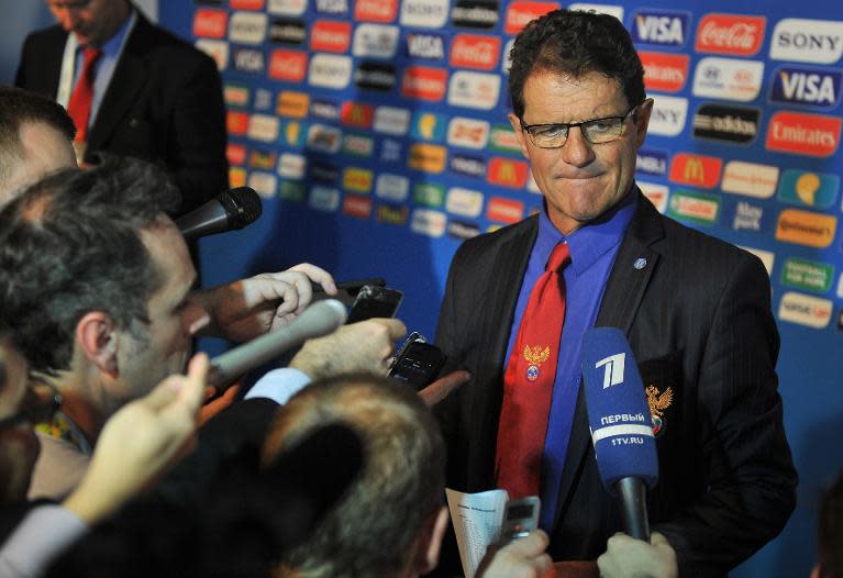 Russia's coach Fabio Capello speaks to the press after the Brazil 2014 FIFA World Cup groups-stage draw, in Costa do Sauipe, Bahia state, Brazil, on December 6, 2013