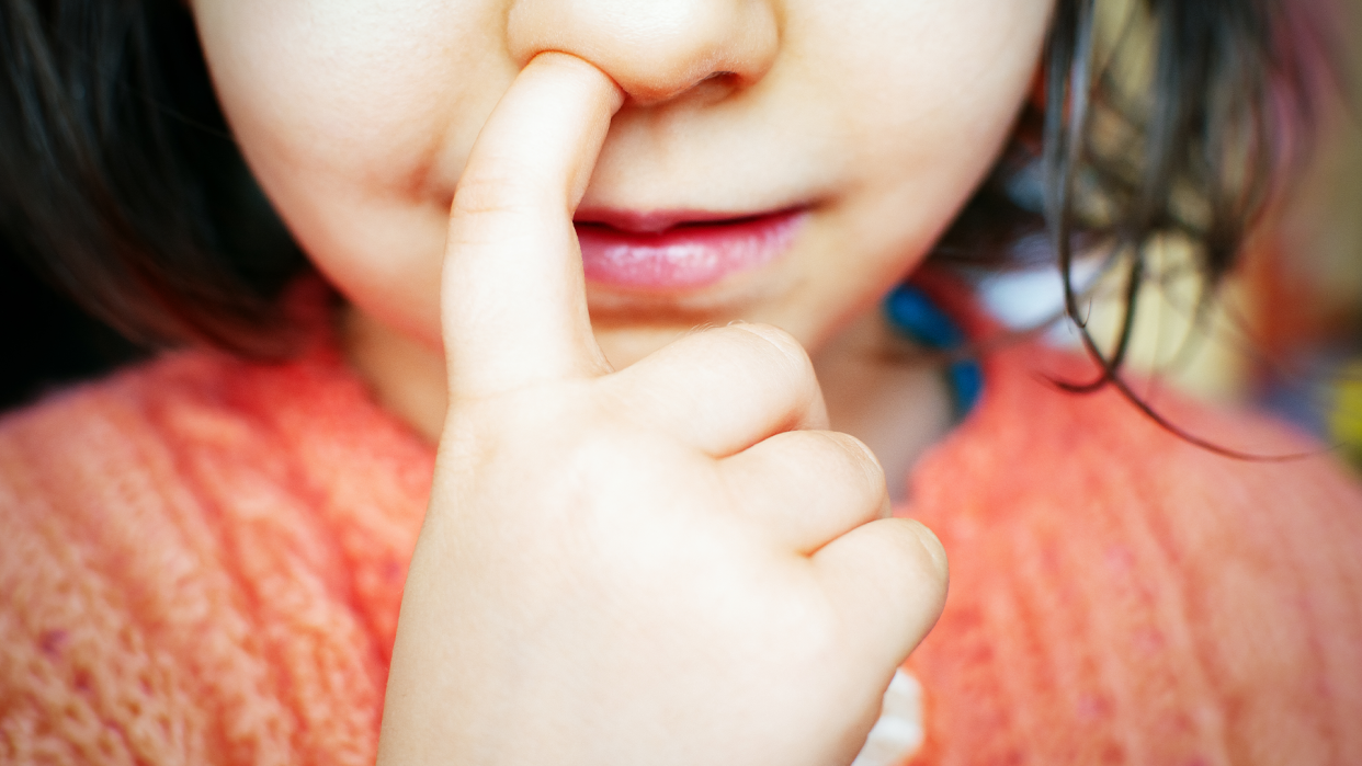 Is your kid's finger seemingly rooted to his nostril? Experts offer tips for curbing nose picking. (Photo: Getty)