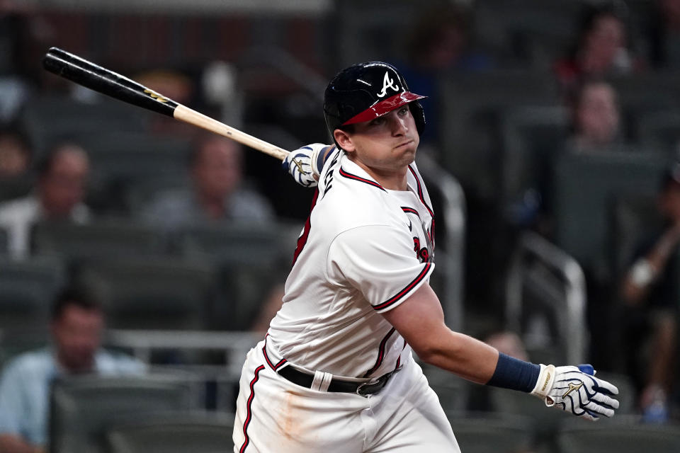 Atlanta Braves third baseman Austin Riley (27) bats during a baseball game against the Chicago Cubs Wednesday, April 28, 2021, in Atlanta. (AP Photo/John Bazemore)