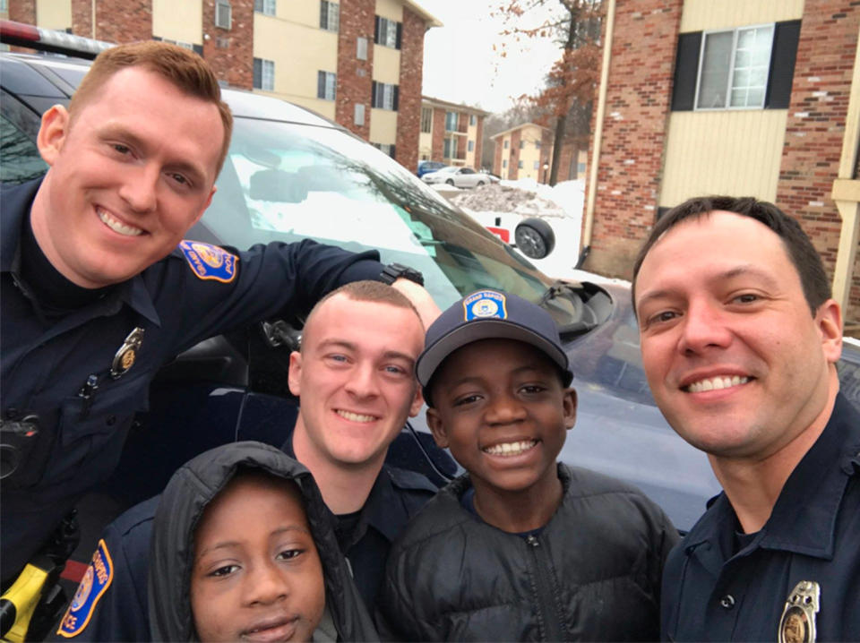 The cop and other police officers brought cake and presents to give Daniel a party to remember. Source: Grand Rapids Police Department/Facebook