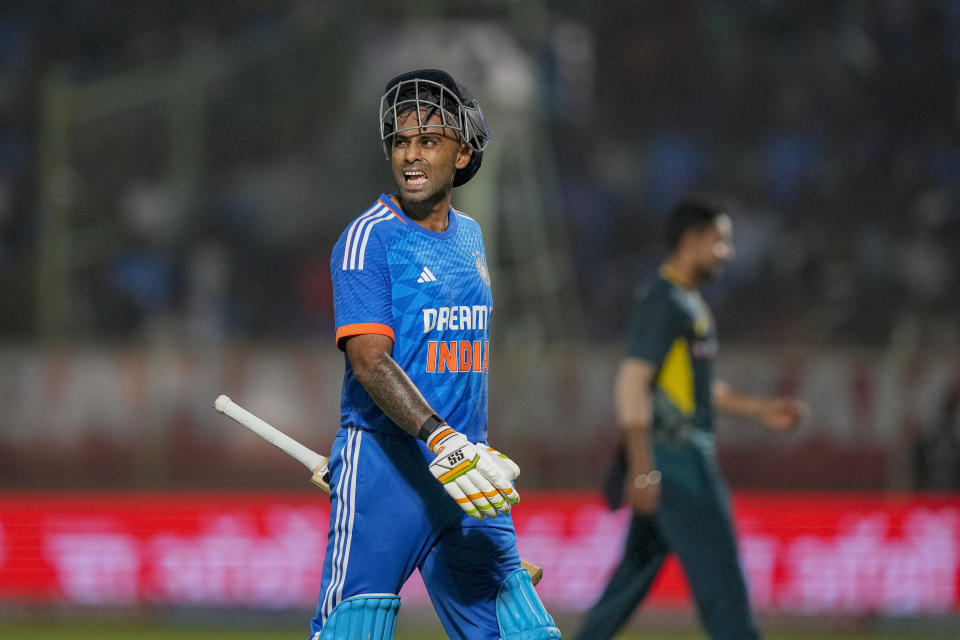 India's captain Suryakumar Yadav reacts as he walks off the field after losing his wicket during the first T20 cricket match between India and Australia in Visakhapatnam, India, Thursday, Nov. 23, 2023. (AP Photo/Mahesh Kumar A.)