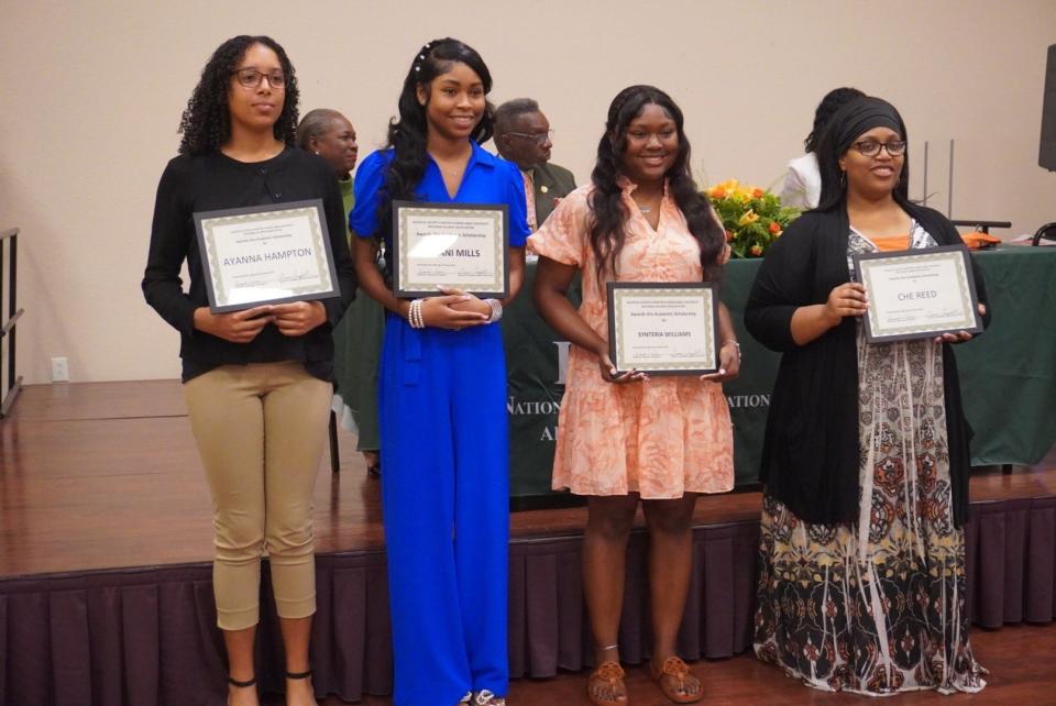 Five high school seniors received $1,000 scholarships to attend Florida A&M University from the Alachua County chapter of the FAMU National Alumni Association. From left are Ayanna Hampton, Leilani Mills, Synteria Williams and Myretta Reed, mother of scholarship recipient Che Reed Jr. Claudette Strickland, the fifth scholarship recipient, was not present.
(Credit: Photo provided by Voleer Thomas)